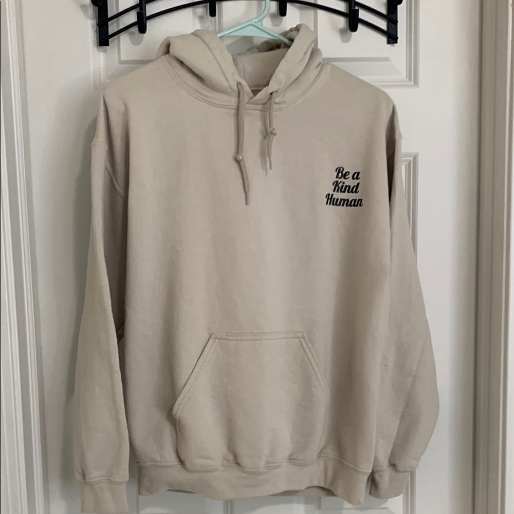 “Be a kind human”Cream Pullover Hoodie with Drawstring Hood. Great mess…